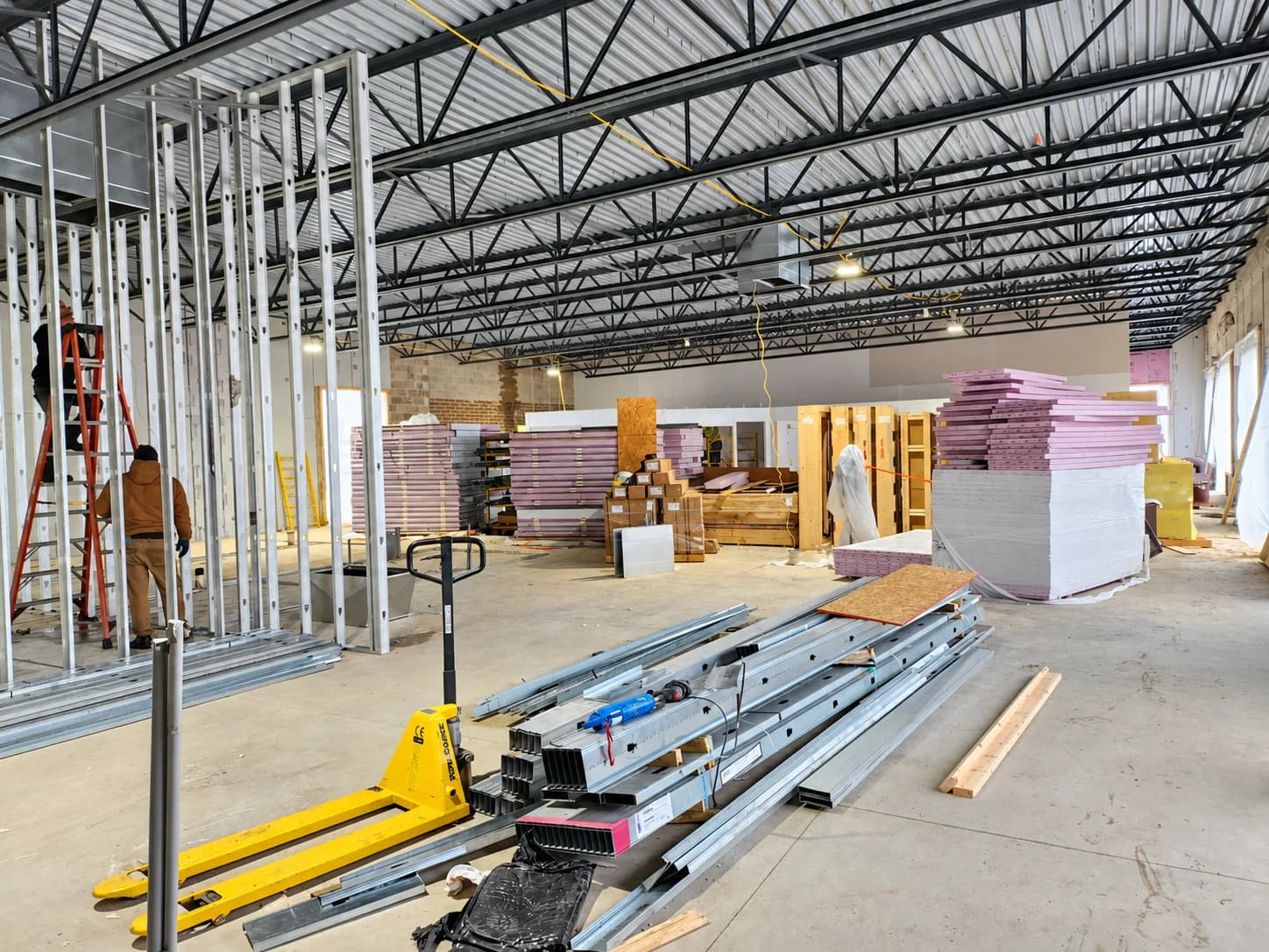 Large interior build-out with metal framing and stacked drywall