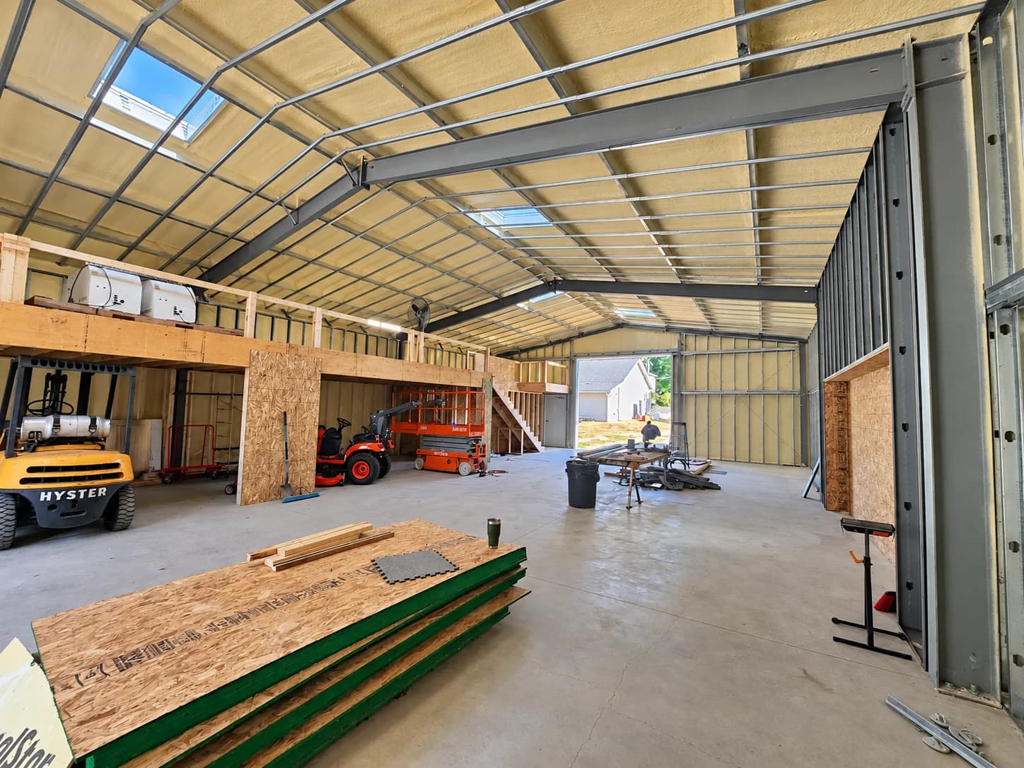Open unfinished building interior before drywall installation